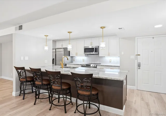Photo 4 of Condo for sale at 7000 E Quincy Ave #105, Denver, CO 80237 | MLS# 9719032 | Listing updated on 2026-10-11