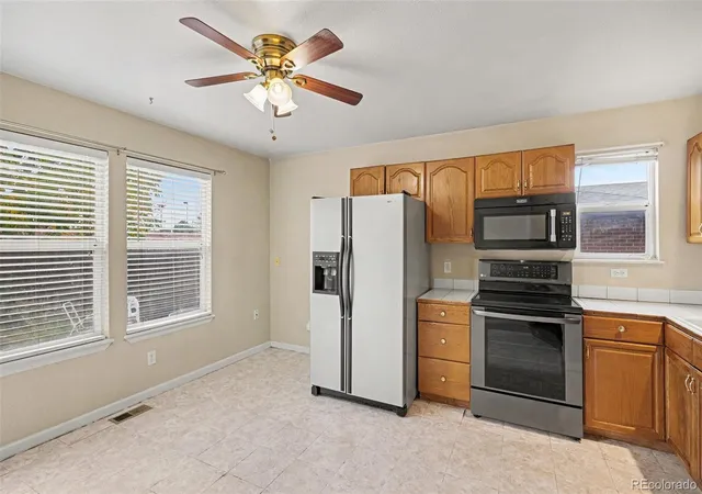 Photo 4 of Townhouse for sale at 3295 S Huron St, Englewood, CO 80110 | MLS# 6399399 | Listing updated on 2026-10-17