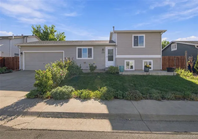 Single family home for sale at 404 Sundance Pkwy, Dacono, CO 80514 | MLS# 2241450