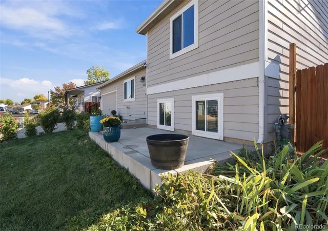 Photo 2 of Single family home for sale at 404 Sundance Pkwy, Dacono, CO 80514 | MLS# 2241450 | Listing updated on 2026-10-27