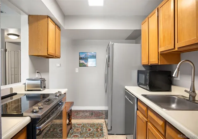 Listing Photo 1 - Condo for sale in building located at 7312 S Xenia Cir, Centennial, CO 80112 - Unit #A