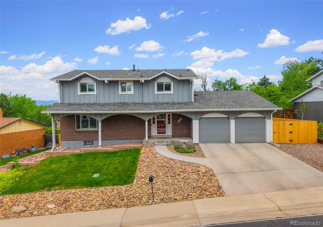 Single family home for sale at 2383 S Holland St, Lakewood, CO 80227 | MLS# 8790494