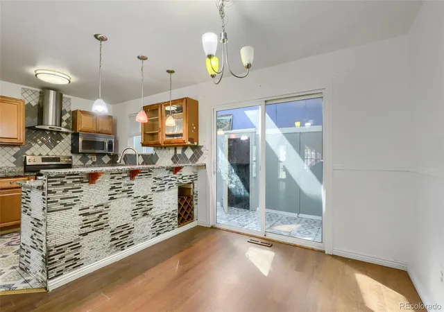 Photo 3 of Townhouse for sale at 11761 E Canal Dr, Aurora, CO 80011 | MLS# 9384424 | Listing updated on 2026-10-26