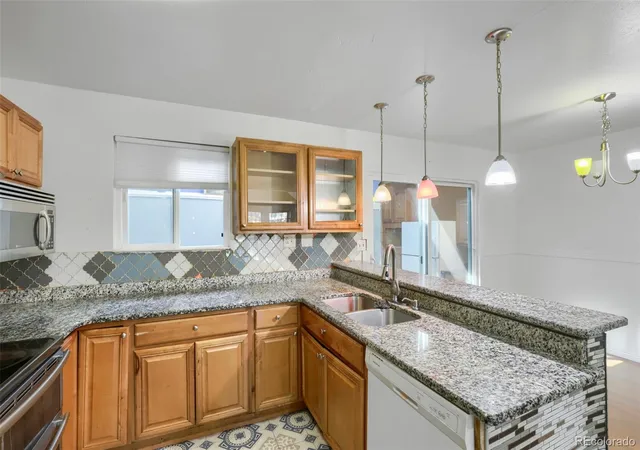 Photo 4 of Townhouse for sale at 11761 E Canal Dr, Aurora, CO 80011 | MLS# 9384424 | Listing updated on 2026-10-26