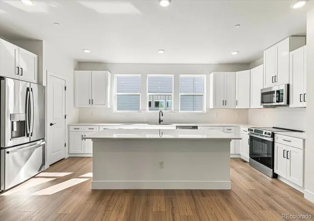 Photo 3 of Townhouse for sale at 2888 W 56th Place, Denver, CO 80221 | MLS# 3774928 | Listing updated on 2026-10-28