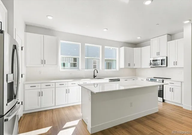 Photo 3 of Townhouse for sale at 2888 W 56th Place, Denver, CO 80221 | MLS# 3774928 | Listing updated on 2026-10-28