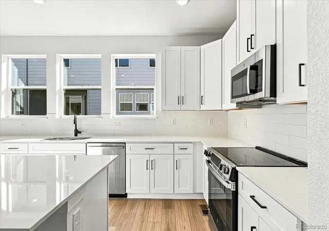 Photo 4 of Townhouse for sale at 2888 W 56th Place, Denver, CO 80221 | MLS# 3774928 | Listing updated on 2026-10-28