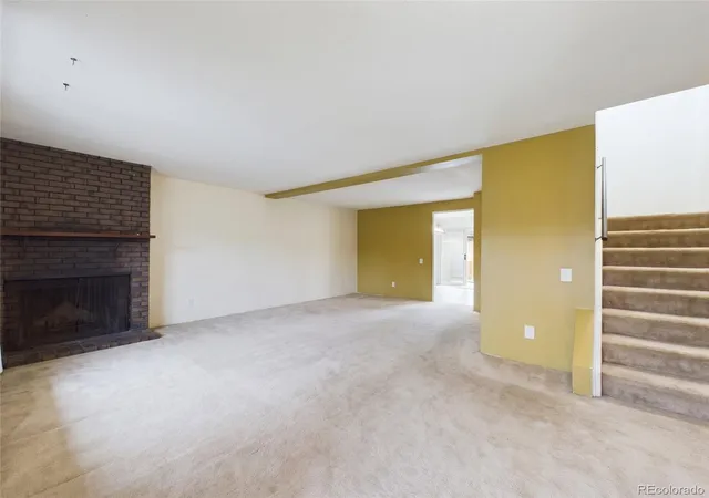 Photo 3 of Townhouse for sale at 7751 W Glasgow Pl, Littleton, CO 80128 | MLS# 8495319 | Listing updated on 2026-10-14