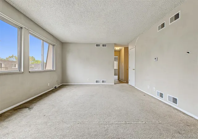 Photo 3 of Condo for sale at 1145 S Oneida St #E, Denver, CO 80224 | MLS# 5548713 | Listing updated on 2026-10-21