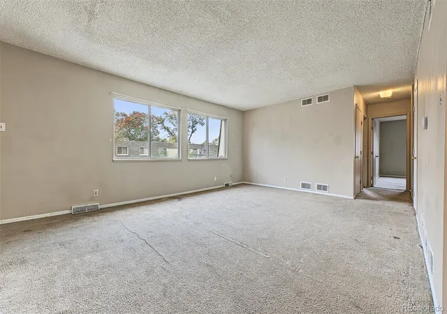 Photo 3 of Condo for sale at 1145 S Oneida St #E, Denver, CO 80224 | MLS# 5548713 | Listing updated on 2026-10-21
