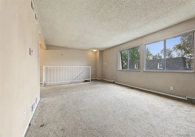 Photo 4 of Condo for sale at 1145 S Oneida St #E, Denver, CO 80224 | MLS# 5548713 | Listing updated on 2026-10-21
