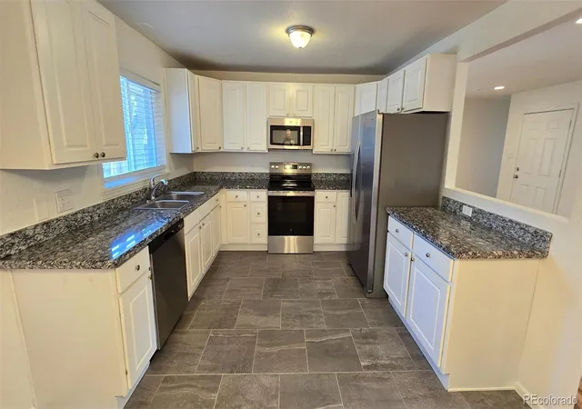 Photo 2 of Single family home for sale at 1817 Yuma St, Colorado Springs, CO 80909 | MLS# 2513745 | Listing updated on 2026-10-27