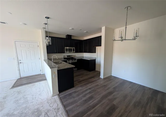 Photo 4 of Condo for sale at 1831 S Dunkirk St #203, Aurora, CO 80017 | MLS# 3418910 | Listing updated on 2026-10-14