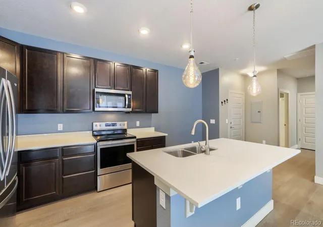 Listing Photo 5 - Condo for sale in building located at 15345 W 64th Ln, Arvada, CO 80007 - Unit #106