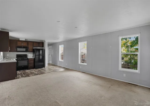 Photo 2 of Single family home for sale at 1404 Macpool St, Dacono, CO 80514 | MLS# 3127719 | Listing updated on 2026-10-21