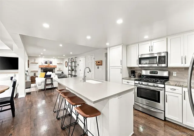 Photo 3 of Single family home for sale at 7624 E Mercer Pl, Denver, CO 80237 | MLS# 7436114 | Listing updated on 2026-10-19