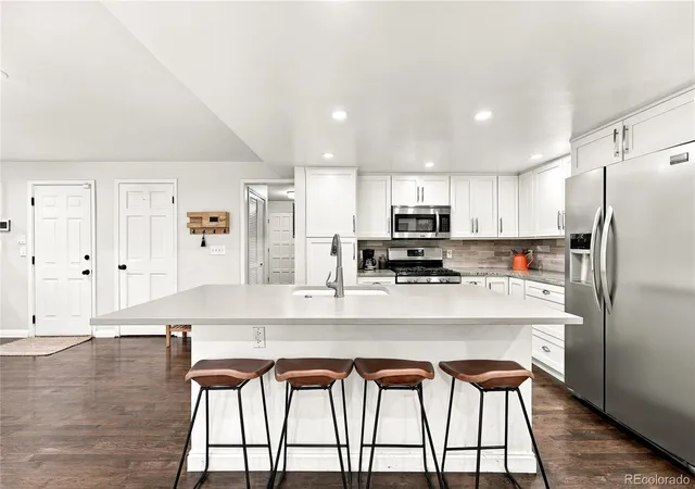 Photo 3 of Single family home for sale at 7624 E Mercer Pl, Denver, CO 80237 | MLS# 7436114 | Listing updated on 2026-10-19