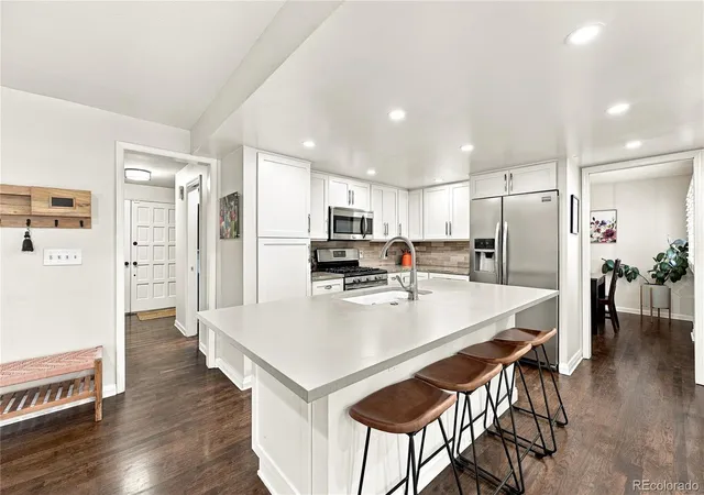 Photo 4 of Single family home for sale at 7624 E Mercer Pl, Denver, CO 80237 | MLS# 7436114 | Listing updated on 2026-10-19