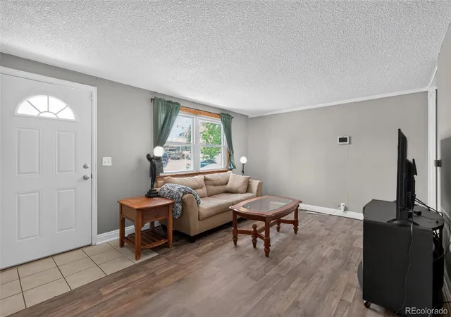 Photo 3 of Single family home for sale at 1580 S Knox Ct, Denver, CO 80219 | MLS# 7846798 | Listing updated on 2026-10-16