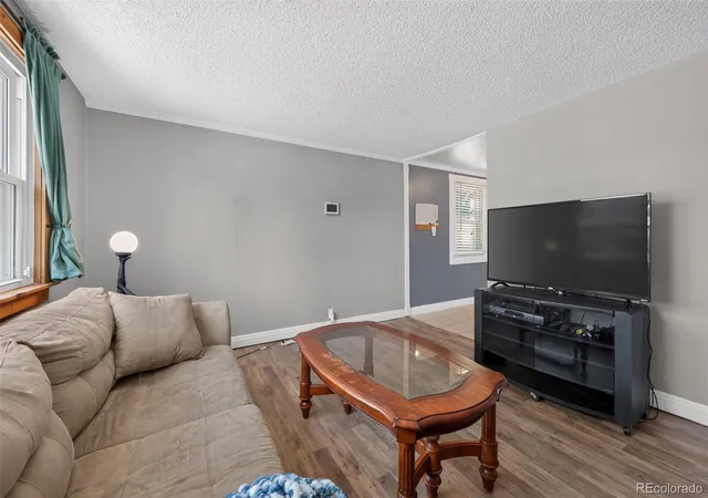 Photo 4 of Single family home for sale at 1580 S Knox Ct, Denver, CO 80219 | MLS# 7846798 | Listing updated on 2026-10-16