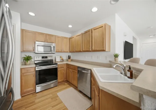 Photo 3 of Townhouse for sale at 17262 E Kansas Dr, Aurora, CO 80017 | MLS# 6959602 | Listing updated on 2026-10-21
