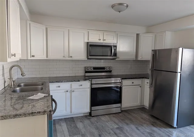 Photo 3 of Townhouse for sale at 14002 E Utah Cir, Aurora, CO 80012 | MLS# 5164787 | Listing updated on 2026-10-27