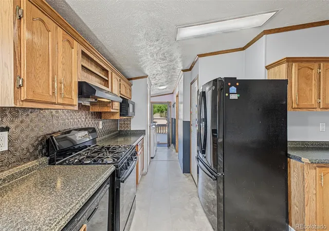 Photo 4 of Manufactured home for sale at 26900 E Colfax Ave, Aurora, CO 80018 | MLS# 9447868 | Listing updated on 2026-10-19