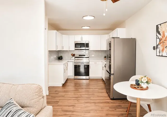 Photo 3 of Condo for sale at 605 S Clinton St #7B, Denver, CO 80247 | MLS# 6527711 | Listing updated on 2026-10-16