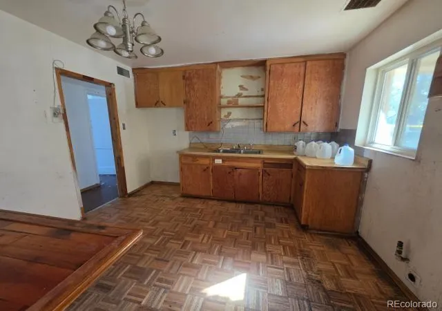Photo 1 of Single family home for sale at 1027 Troy St, Aurora, CO 80011 | MLS# 8384479 | Listing updated on 2026-10-27