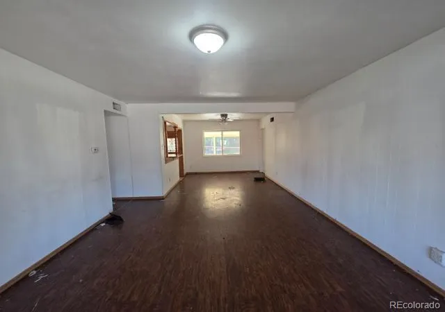 Photo 3 of Single family home for sale at 1027 Troy St, Aurora, CO 80011 | MLS# 8384479 | Listing updated on 2026-10-27