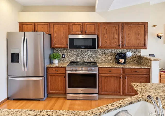Photo 4 of Condo for sale at 7490 W Coal Mine Ave #A, Littleton, CO 80123 | MLS# 6059312 | Listing updated on 2026-10-22