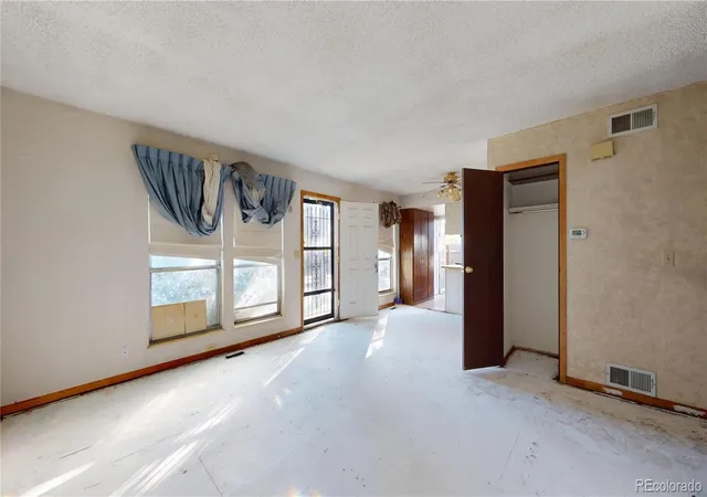 Photo 2 of Townhouse for sale at 10001 E Evans Ave #83A, Aurora, CO 80247 | MLS# 7670282 | Listing updated on 2026-10-17