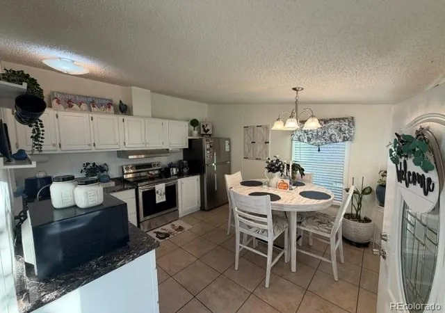 Photo 3 of Manufactured home for sale at 14265 E 19th Place, Aurora, CO 80011 | MLS# 8345510 | Listing updated on 2026-10-17