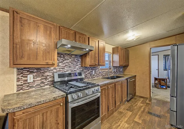 Photo 2 of Manufactured home for sale at 5220 Riverdale Ave, Denver, CO 80229 | MLS# 5230400 | Listing updated on 2026-10-28