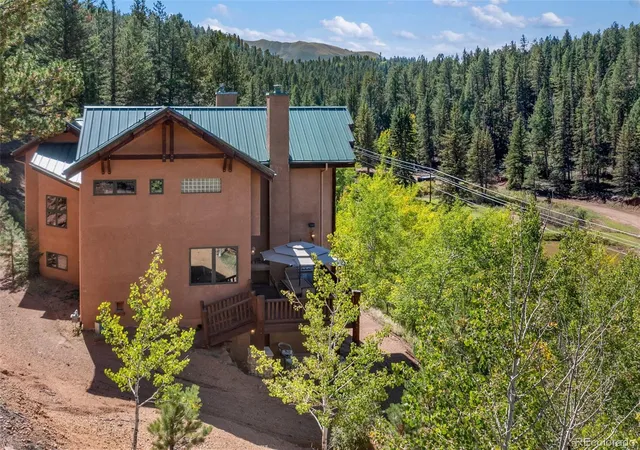 Photo 4 of Single family home for sale at 4214 Trout Crk Rd, Woodland Park, CO 80863 | MLS# 5318496 | Listing updated on 2026-10-21