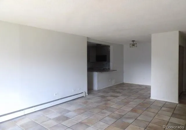 Photo 3 of Condo for sale at 2281 S Vaughn Way #117A, Aurora, CO 80014 | MLS# 2430649 | Listing updated on 2026-10-18