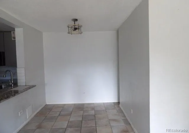 Photo 4 of Condo for sale at 2281 S Vaughn Way #117A, Aurora, CO 80014 | MLS# 2430649 | Listing updated on 2026-10-18