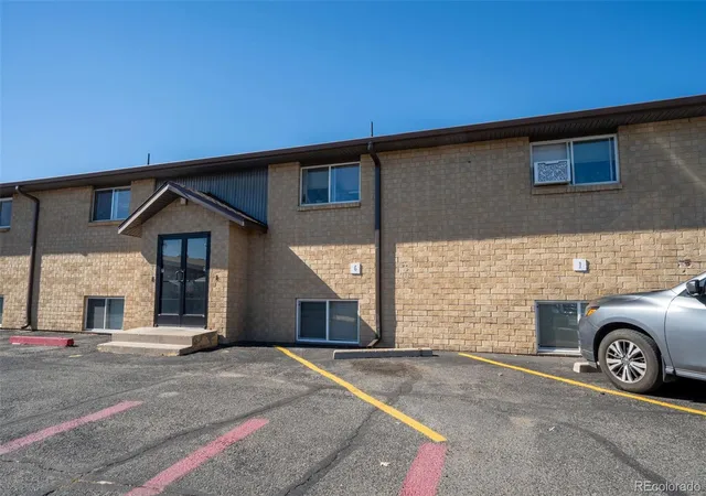 Listing Photo 1 - Condo for sale in building located at 700 Jessup St, Brighton, CO 80601 - Unit #5