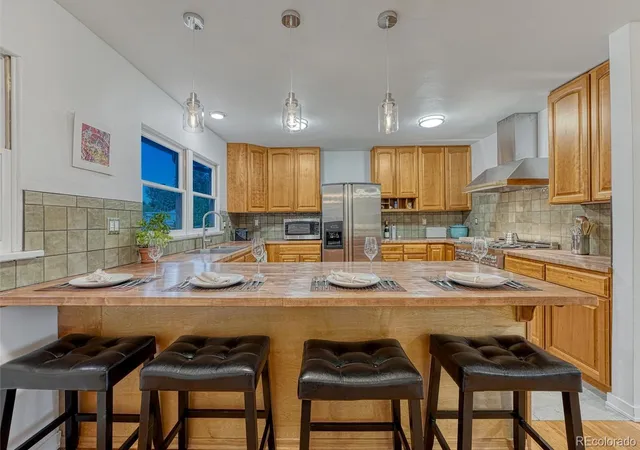 Photo 2 of Single family home for sale at 1221 E Madison St, Colorado Springs, CO 80907 | MLS# 3209560 | Listing updated on 2026-10-20