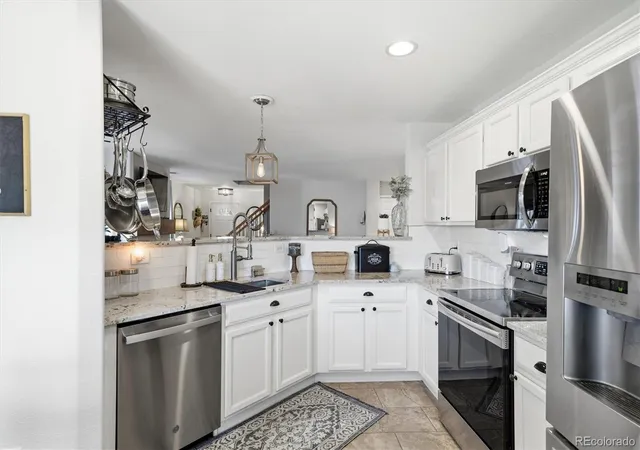 Photo 3 of Single family home for sale at 9735 Marmot Ridge Cir, Littleton, CO 80125 | MLS# 9715249 | Listing updated on 2026-10-23