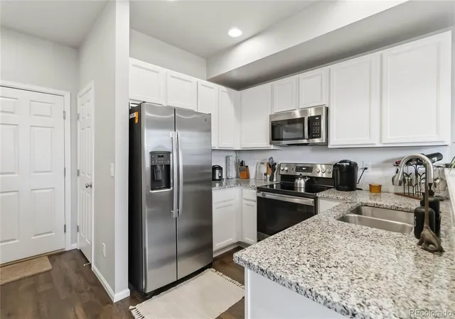 Photo 3 of Townhouse for sale at 6531 N Dunkirk St, Denver, CO 80249 | MLS# 6875449 | Listing updated on 2026-10-23