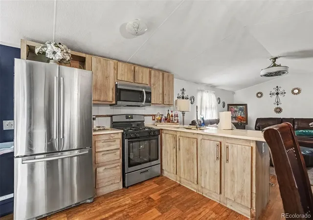 Photo 3 of Manufactured home for sale at 17012 E Batavia Pl, Aurora, CO 80011 | MLS# 2023418 | Listing updated on 2026-10-27