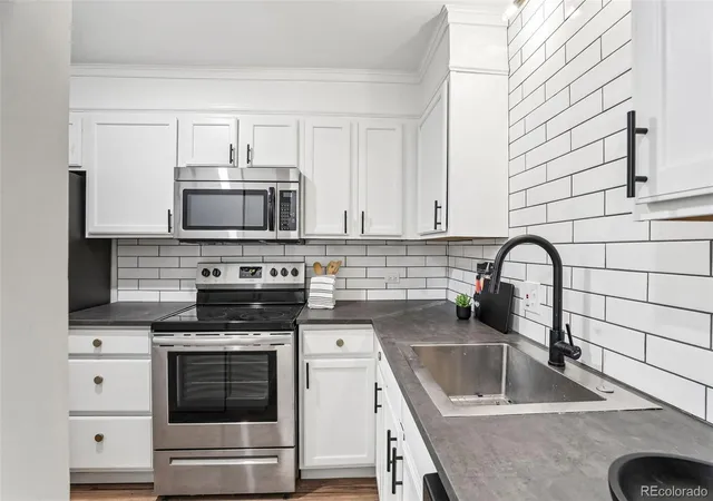 Photo 1 of Condo for sale at 6455 E Bates Ave #103, Denver, CO 80222 | MLS# 4176398 | Listing updated on 2026-10-28