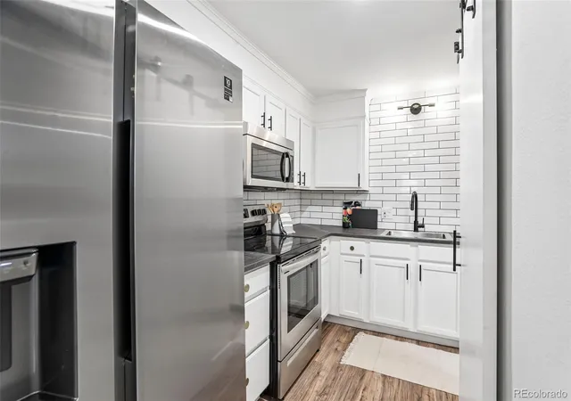 Photo 2 of Condo for sale at 6455 E Bates Ave #103, Denver, CO 80222 | MLS# 4176398 | Listing updated on 2026-10-28