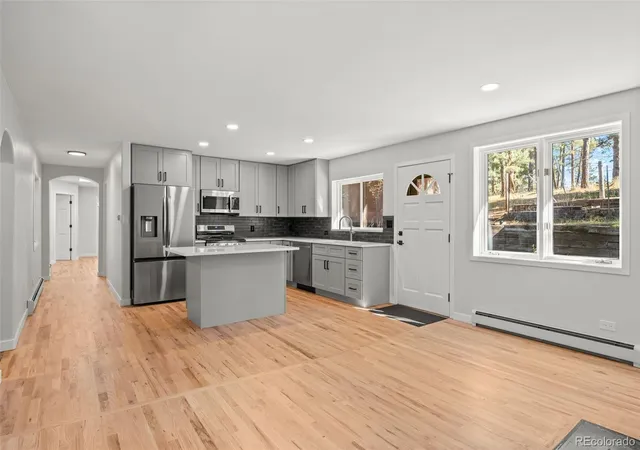 Photo 1 of Single family home for sale at 5596 Lee Dr, Evergreen, CO 80439 | MLS# 2721069 | Listing updated on 2026-10-29
