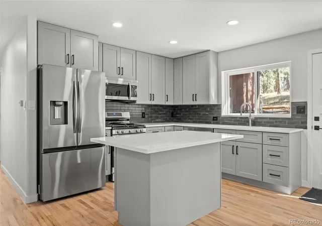Photo 3 of Single family home for sale at 5596 Lee Dr, Evergreen, CO 80439 | MLS# 2721069 | Listing updated on 2026-10-29