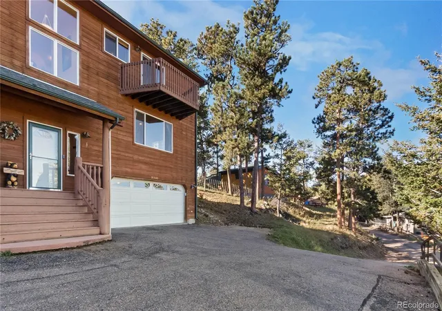 Photo 2 of Single family home for sale at 30080 Fir Dr, Evergreen, CO 80439 | MLS# 7974998 | Listing updated on 2026-10-23
