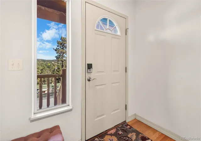 Photo 3 of Single family home for sale at 30080 Fir Dr, Evergreen, CO 80439 | MLS# 7974998 | Listing updated on 2026-10-23