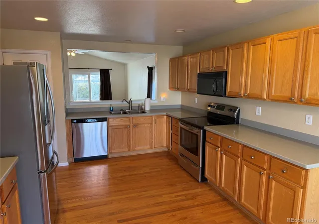 Photo 3 of Single family home for sale at 13118 Clayton Ct, Thornton, CO 80241 | MLS# 2303902 | Listing updated on 2026-10-26