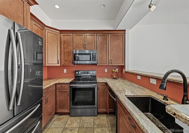 Photo 3 of Condo for sale at 9643 W Chatfield Ave #B, Littleton, CO 80128 | MLS# 1967339 | Listing updated on 2026-10-30